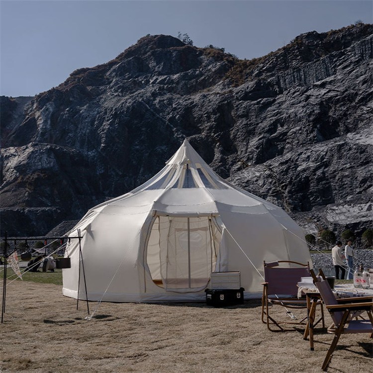 ما هي المزايا التي تقدمها خيمة الجرس القماشية الخارجية YMOUTDOOR إلى الأعمال الفاخرة؟